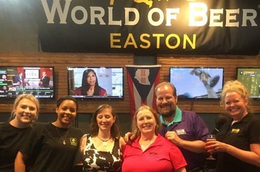 WOB rewards members pose at WOB Easton location with WOB staff